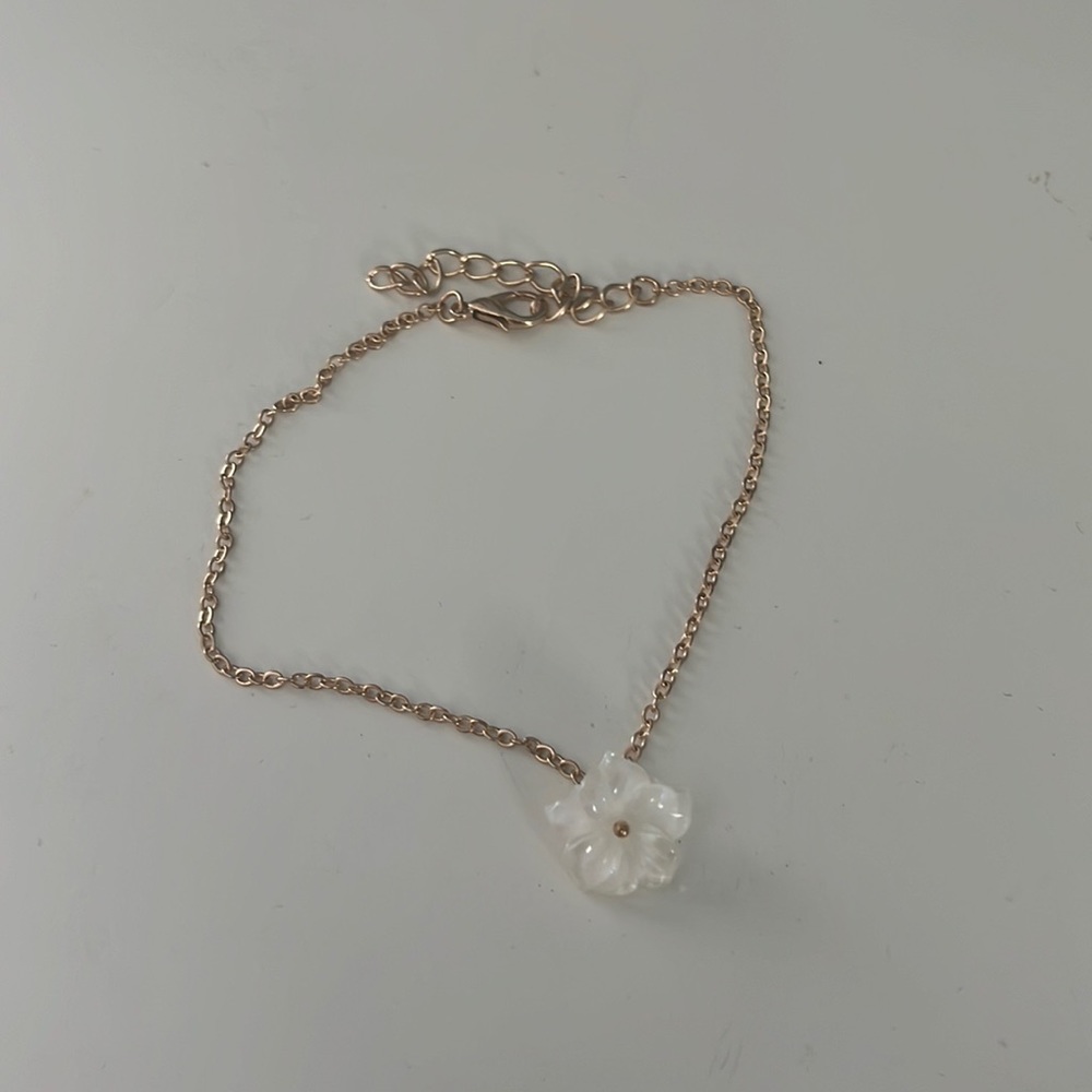 gold and pearly white flower bracelet